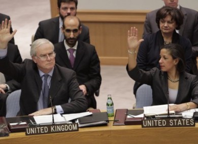 British Ambassador to the United Nations Mark Lyall Grant and American Ambassador Susan Rice vote.