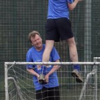 Cllr Aidan Culhane, below, helps Fianna Fail TD Barry Andrews retrieve a ball from the netting during the Newstalk General Election charity football match in aid of Barnardos.