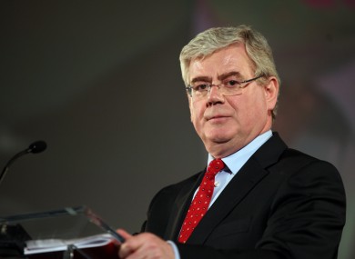 Eamon Gilmore's Labour Party has approved the coalition agreement struck with Fine Gael by an 'overwhelming majority'.
