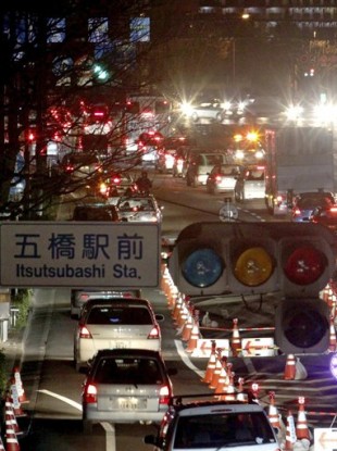 Traffic jams are seen as the traffic lights were turned out due to a blackout following a big aftershock in Sendai, northern Japan early Friday.
