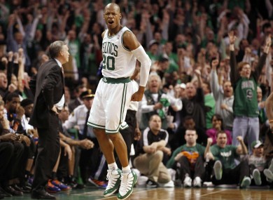 Celtics' Ray Allen celebrates after hitting the game winning three-pointer.