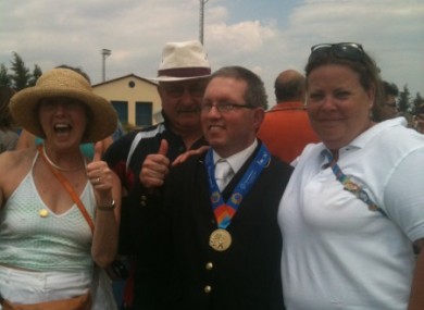 Equestrian gold medal winner Steven Yetman celebrates yesterday with his parents and coach