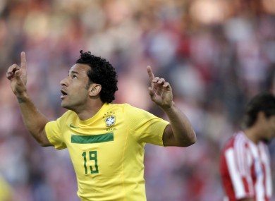 Fred celebrates his late goal against Paraguay