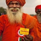 A Hindu holy man and supporter of India anti-corruption activist Anna Hazare shows his support at the site of the hunger strike in New Delhi,India, Saturday, Aug. 20,2011. 



(AP Photo/Kevin Frayer)