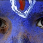 An Indian schoolboy, dressed as Hindu God Krishna, participates in a rally in support of anti-corruption activist Anna Hazare, in Allahabad, India. 


(AP Photo/Rajesh Kumar Singh)
