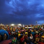 Pilgrims pray with Pope Benedict XVI's at Cuatro Vientos airport in Madrid, Saturday Aug. 20, 2011.


(AP Photo/Andres Kudacki)