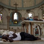 Homeless people sleep in the destroyed Santa Ana church, which was affected by the 2010 earthquake in Port-au-Prince, Haiti, Saturday Aug. 20, 2011. 


In outlining a new program to move into homes people displaced by the earthquake, officials of the intergovernmental organization International Organization for Migration said approximately 594,000 people are living in nearly 900 camps. 


(AP Photo/Ramon Espinosa)