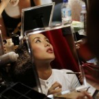 Model Naomi Obata prepares make-up before a show at the Tokyo Fashion Fuse event in Tokyo Saturday Aug. 20, 2011. 



(AP Photo/Greg Baker)