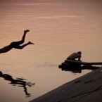 A man dives at sunset in a lake at the end of an unusually hot day in Bucharest, Romania, Wednesday, Aug. 24, 2011.


Temperatures climbed to 35 degrees Centigrade in many regions across Romania as a heat wave affects the Balkans region.


(AP Photo/Vadim Ghirda)