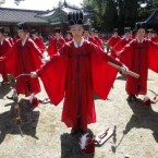 South Korean students wearing traditional costumes perform during a graduation ceremony at Sungkyunkwan University in Seoul, South Korea, Thursday, Aug. 25, 2011. 


(AP Photo/Ahn Young-joon)
