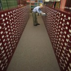 Peter Sokolowski, editor at large for Merriam-Webster Inc., thumbs through the index card files at the dictionary publisher's headquarters in Springfield, Mass. 


More than 100 new terms are were revealed Thursday for the dictionary publisher's newest edition.