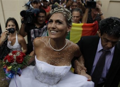 Transsexual Wendy Iriepa arrives for her wedding with best man Reinaldo Escobar in Havana, Cuba, Saturday Aug. 13, 2011.