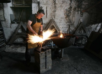 Blacksmith David Page demonstrates his skill in a Heritage Week event today.