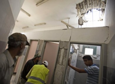 Israelis inspect damage to school hit by Palestinian militant attacks on southern Israel