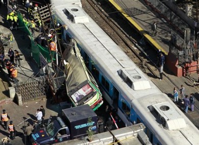 The rush-hour crash involving two trains and a bus killed 11 people and injured hundreds.