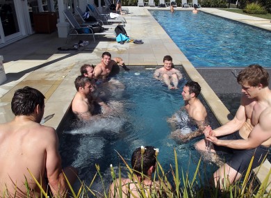 Fergus McFadden and teammates relax after training.