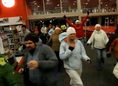 Shoppers rush into a shop at 4am on Black Friday in 2010 to ensure they pick up a bargain
