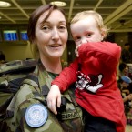 Louise Prendergast is welcomed home by Abby Ganly (aged 3) at Dublin Airport as the 104th Battalion return home from peacekeeping duty in Lebanon. Photo: Laura Hutton/Photocall Ireland