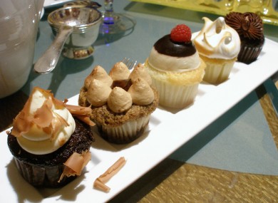 From left to right: Black Forest, Tiramisu, Boston Cream Pie, Lemon Meringue, and Irish Coffee Petite Cupcakes. DELICIOUS.