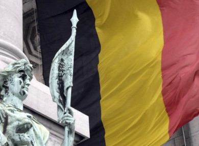 A tattered Belgian flag blowing in the wind at the Cinquantenaire monument in Brussels (File)