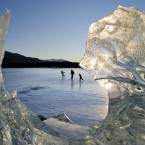 A family skates across Mendenhall Lake, in  Juneau, Alaska. (AP)