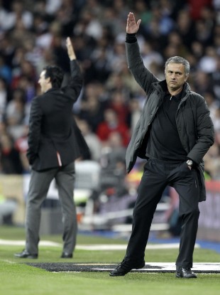 Jose Mourinho and Valencia coach Unai Emery in a dual taxi-hailing pose