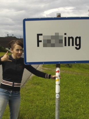 The Austrian village commands more than its fair share of visitors, who come to pose at its roadsigns.