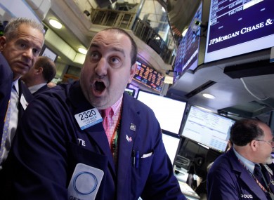 A trader at the post that handles JP Morgan at the New York Stock Exchange on Friday