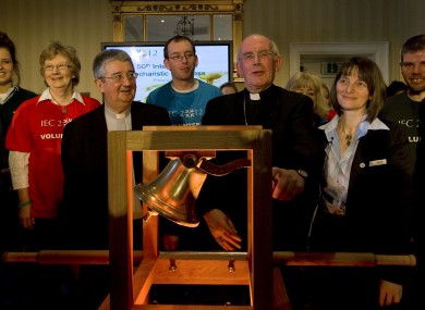 Archbishop of Dublin, Diarmuid Martin (centre left) pictured with Cardinal Sean Brady, Archbishop of Armagh (centre) at the launch of the International Eucharistic Congress 2012 alongside volunteers