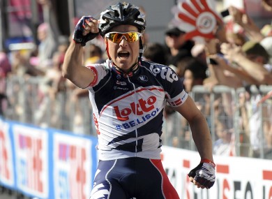 Denmark's Lars Bak celebrates as he crosses the finish line to win the 12th stage of the Giro d'Italia.
