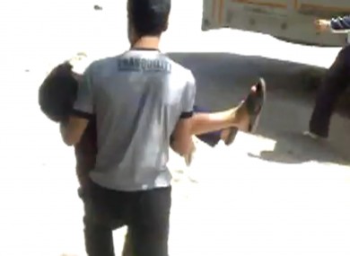 Image made from amateur video released by Shaam News Network purports to ... Image made from amateur video released by Shaam News Network purports to ...