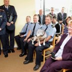 Pictured with 'Angel' sitting on his lap is Sgt William Kirwan, who had saved two Rottweilers who had been reduced to skin and bone.
Photo: Mark Stedman/Photocall Ireland