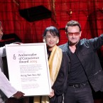 Iconic prisoner of conscience Aung San Suu Kyi collects the Amnesty International Ambassador of Conscience award at the Electric Burma Concert held her in honour in Dublin, Ireland. Aung San Suu Kyi was presented with the award by Bono and Amnesty International Secretary General Salil Shetty. Photo: Mark Stedman/Photocall Ireland