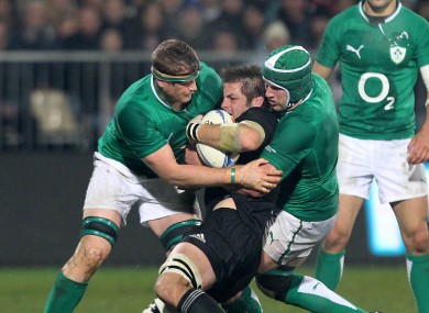 Sean O'Brien gets to grips with All Black captain Richie McCaw.