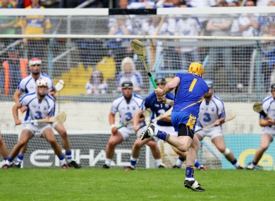 Clare goalkeeper Patrick Kelly attempts a shot on goal during the final moments of the match.