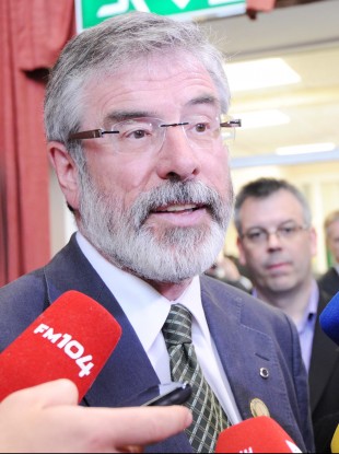Adams speaks to the media at Dublin Castle yesterday