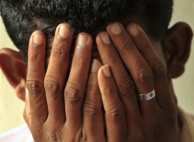 File photo of a Sri Lankan national arrested in May by police while preparing to migrate illegally to Australia.
