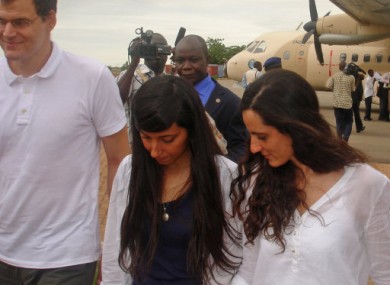 The free hostages after landing in the Burkina Faso capital, Ouagadougou, yesterday