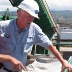 Ric Gillespie, right, founder of The International Group for Historic Aircraft Recovery, watches equipment testing alongside Wolfgang Burnside from aboard a ship at port in Honolulu on Sunday, July 1, 2012. Gillespie is leading a month-long voyage to find plane wreckage from Amelia Earhart's Lockheed Electra, which disappeared over the South Pacific 75 years ago.
(AP Photo/Oskar Garcia)