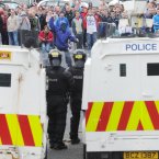 Police and nationalists face off in the Ardoyne area of Belfast (Photo: Laura Hutton/Photocall Ireland)