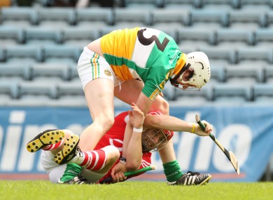 Offaly's David Kenny challenges Cork's Paudie O'Sullivan in last year's clash.