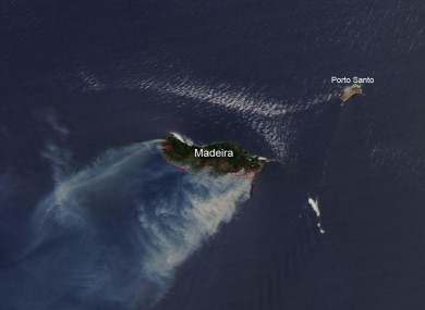 NASA’s Aqua satellite captured this natural-color image on July 19, a day after the fires broke out. Red outlines indicate high surface temperatures associated with actively burning fires. Thick smoke blows away from the blazes toward the southwest.
