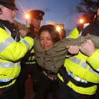 Shell to Sea activists clash with Gardaí after they blocked the path of a convoy containing tunnel boring machinery on its way to the Shell Bellanaboy Gas refinery in Mayo.