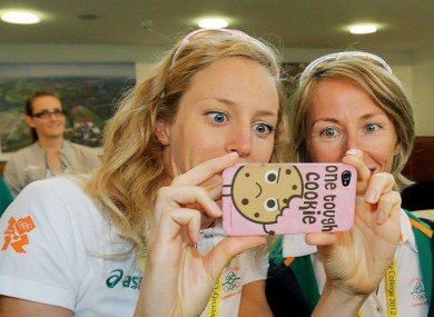 One tough cookie: Morrison looks back on her picture of Enda Kenny with 20k racewalker, Olive Loughnane.