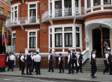 Police patrol outside the Ecuadorian embassy in Knightsbridge, where Julian Assange is inside - having been granted political asylum by Ecuador while remaining wanted by Britain for extradition.