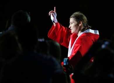 Katie Taylor takes the ExCel Arena crowd's applause.