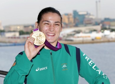 Katie Taylor celebrates with her gold medal