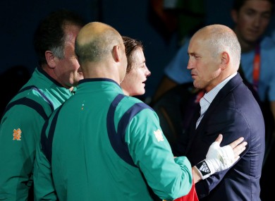 Ireland's Katie Taylor is congratulated by Barry McGuigan.