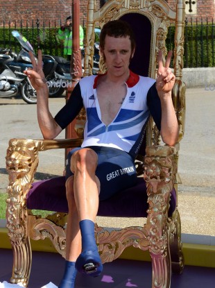 Great Britain's Bradley Wiggins sits on the throne as he celebrates winning the Men's Individual Time Trial today. It's a good look.