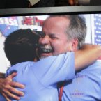 In this video grab Rob Manning, Flight System Chief Engineer at the Jet Propulsion Laboratory in Pasadena, California (right) celebrates NASA's high-tech Mars rover Curiosity safe landing into Mars surface (AP Photo/Damian Dovarganes)